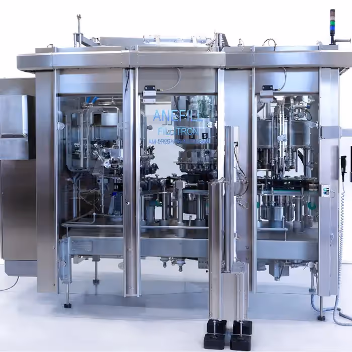 Monoblock filler and carbonator for soft drinks